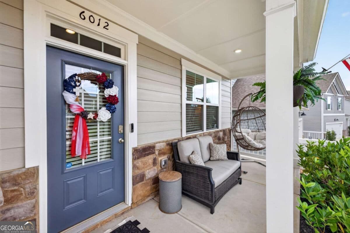5 bedroom, 3 bathroom, 2,539 sq ft single family residence for sale at 6012 Screech Owl Drive, Flowery Branch, GA 30542 — photo 2
