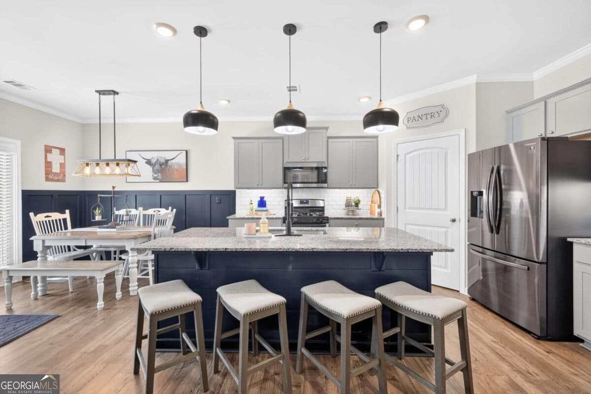 5 bedroom, 3 bathroom, 2,539 sq ft single family residence for sale at 6012 Screech Owl Drive, Flowery Branch, GA 30542 — photo 5
