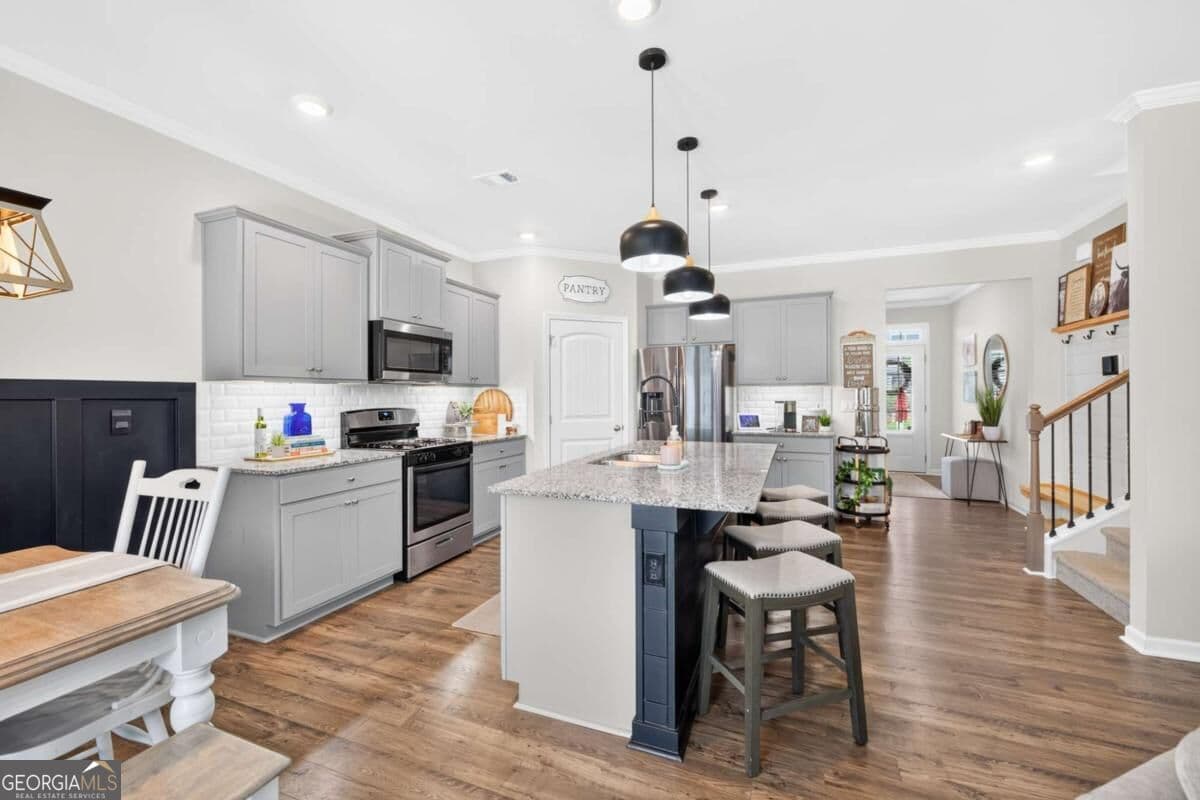 5 bedroom, 3 bathroom, 2,539 sq ft single family residence for sale at 6012 Screech Owl Drive, Flowery Branch, GA 30542 — photo 8