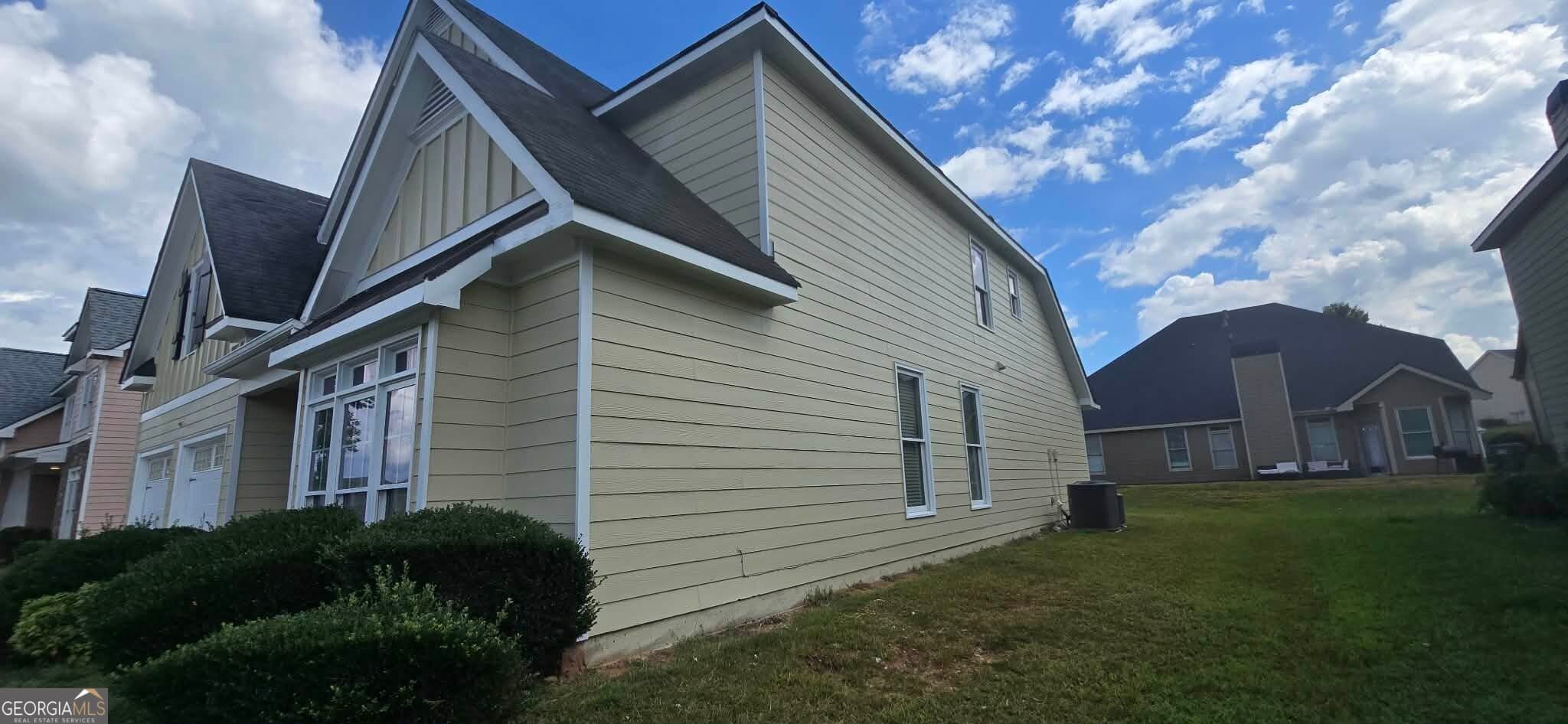 5 bedroom, 3.5 bathroom, 3,321 sq ft single family residence for sale at 55 Harrison Circle, Covington, GA 30016 — photo 5