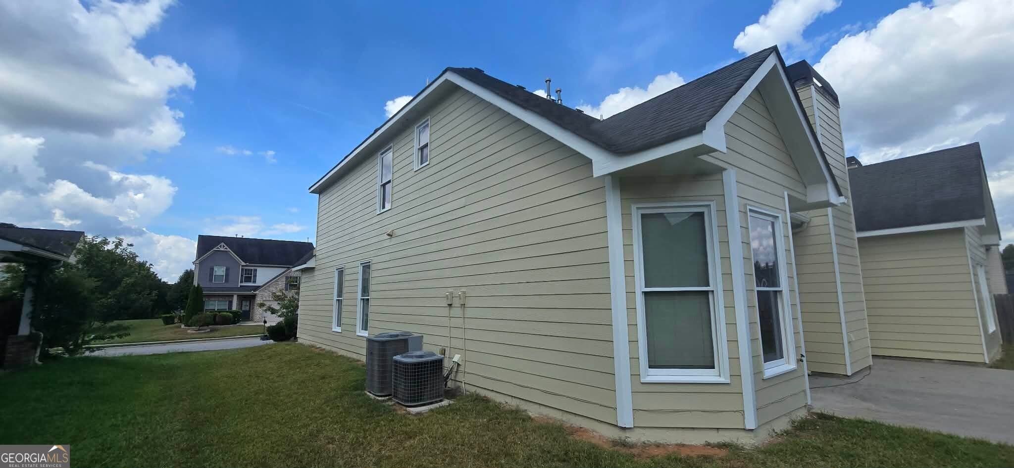 5 bedroom, 3.5 bathroom, 3,321 sq ft single family residence for sale at 55 Harrison Circle, Covington, GA 30016 — photo 4