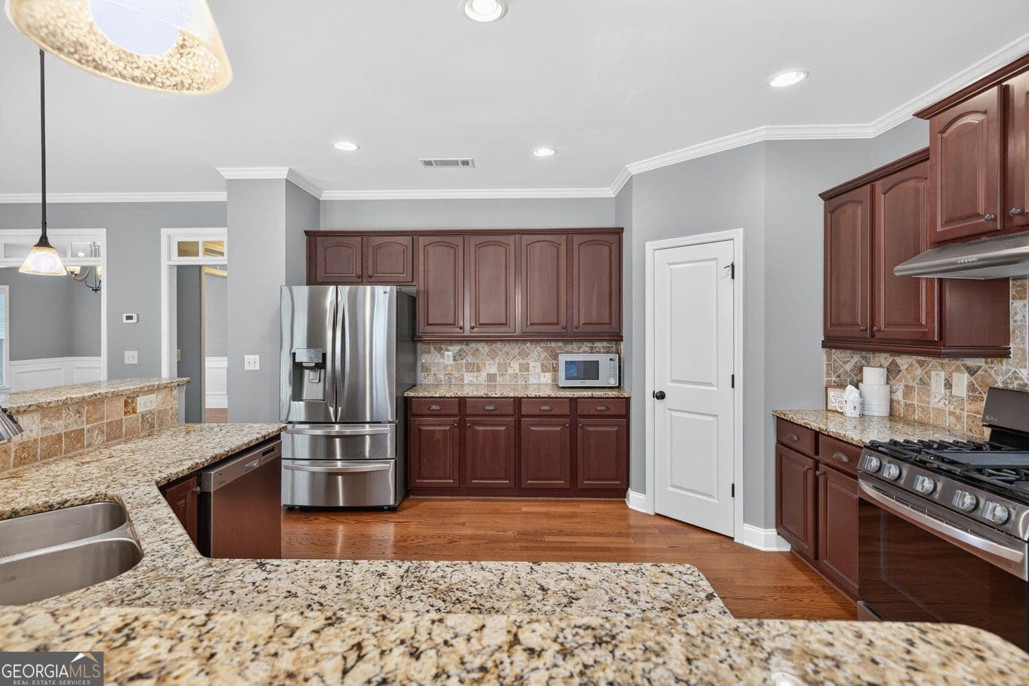 4 bedroom, 3.5 bathroom, 3,227 sq ft single family residence for sale at 8225 Majors Glen Court, Cumming, GA 30041 — photo 6