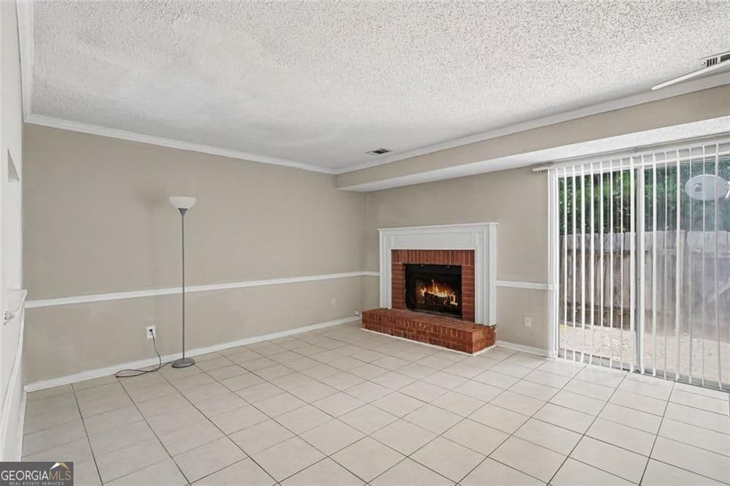 2 bedroom, 2.5 bathroom, 1,120 sq ft townhouse for sale at 8547 Jamestown Way, Jonesboro, GA 30238 — photo 2