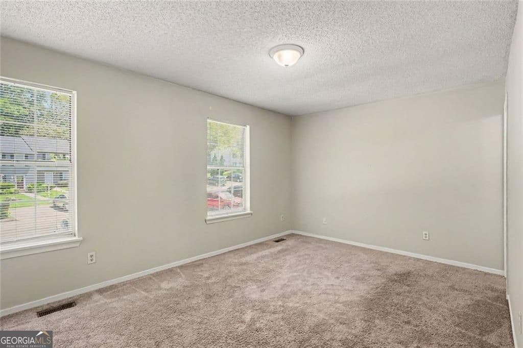 2 bedroom, 2.5 bathroom, 1,120 sq ft townhouse for sale at 8547 Jamestown Way, Jonesboro, GA 30238 — photo 9