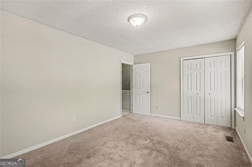 2 bedroom, 2.5 bathroom, 1,120 sq ft townhouse for sale at 8547 Jamestown Way, Jonesboro, GA 30238 — photo 10