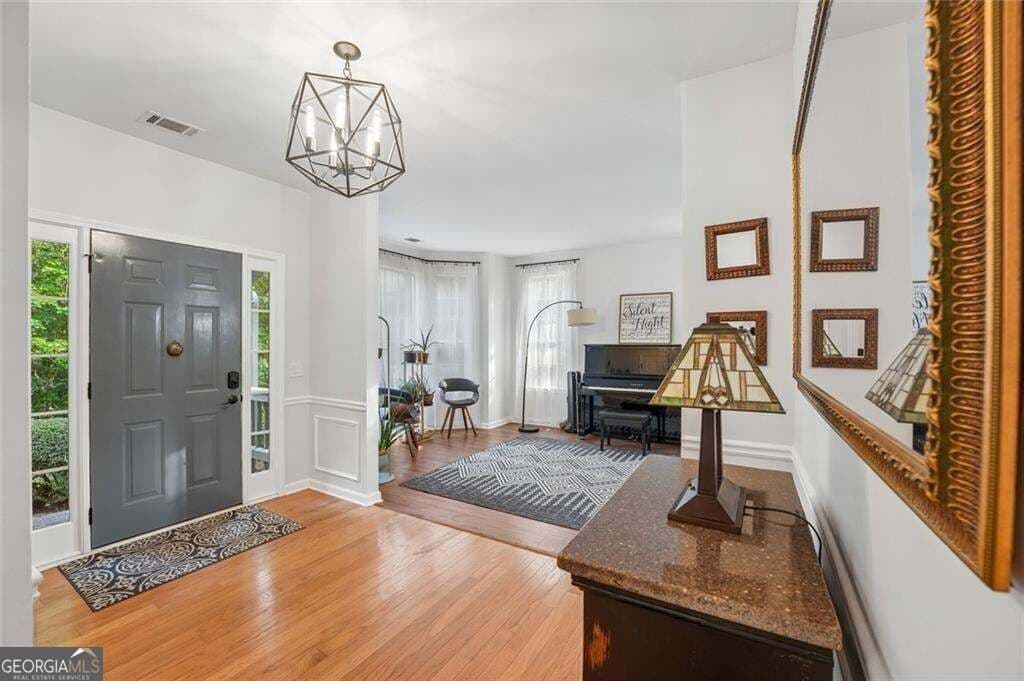 6 bedroom, 3.5 bathroom, 3,744 sq ft single family residence for sale at 195 Sable Pointe Drive, Milton, GA 30004 — photo 5