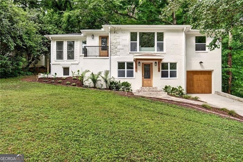 4 bedroom, 3 bathroom, 2,540 sq ft single family residence for sale at 656 Channing Drive, Atlanta, GA 30318 — photo 1 of 38
