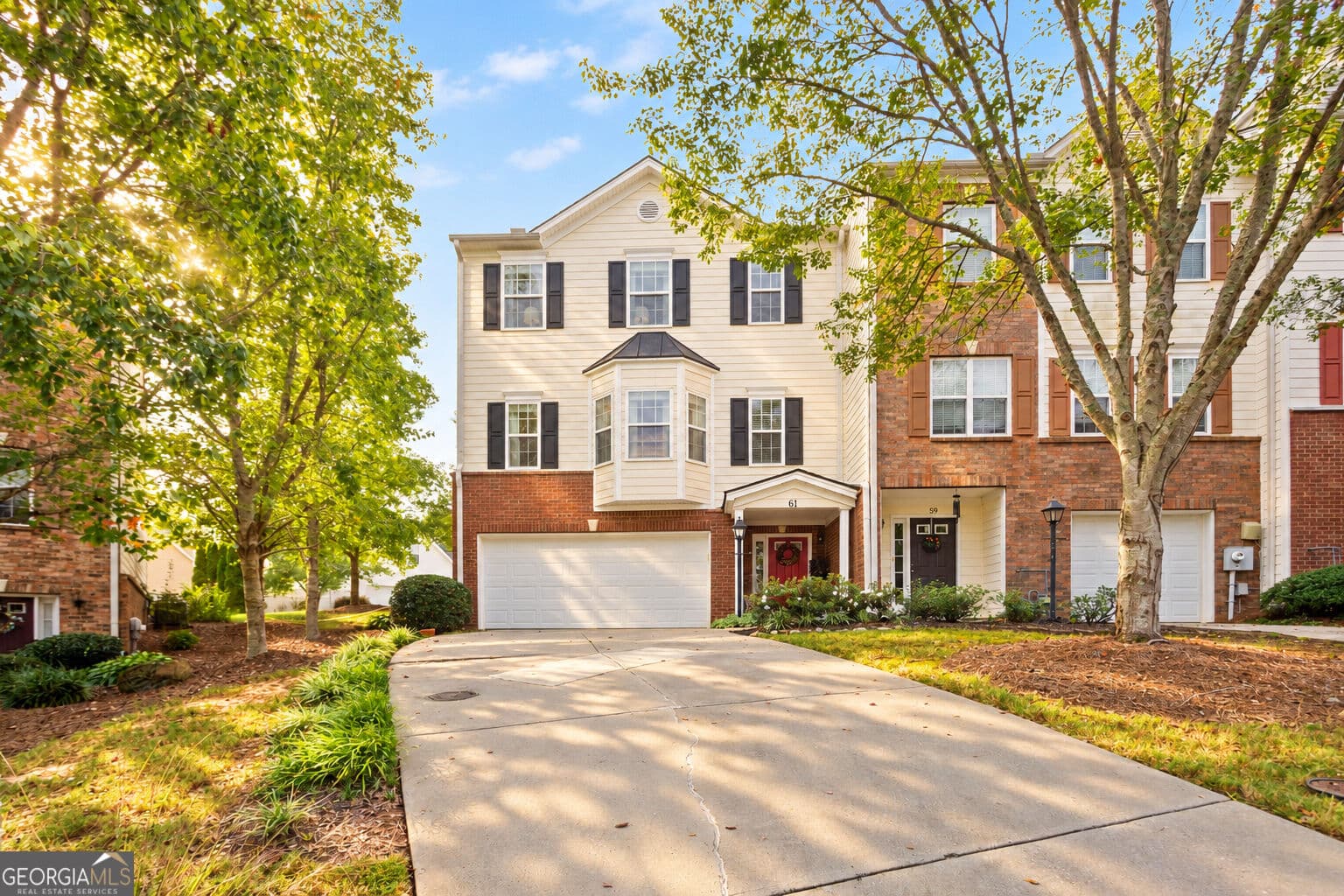 2 bedroom, 2 bathroom, 2,008 sq ft townhouse for sale at 61 Corbel Way, Newnan, GA 30265 — photo 1 of 35
