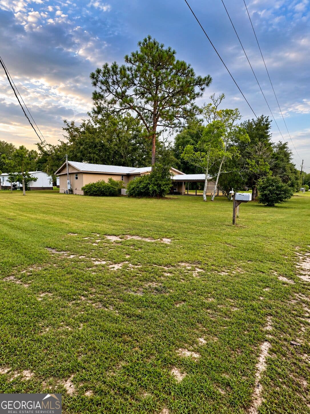 4 bedroom, 1.5 bathroom, 1,280 sq ft manufactured home,single family residence for sale at 118 Mosley Street, Reidsville, GA 30453 — photo 3