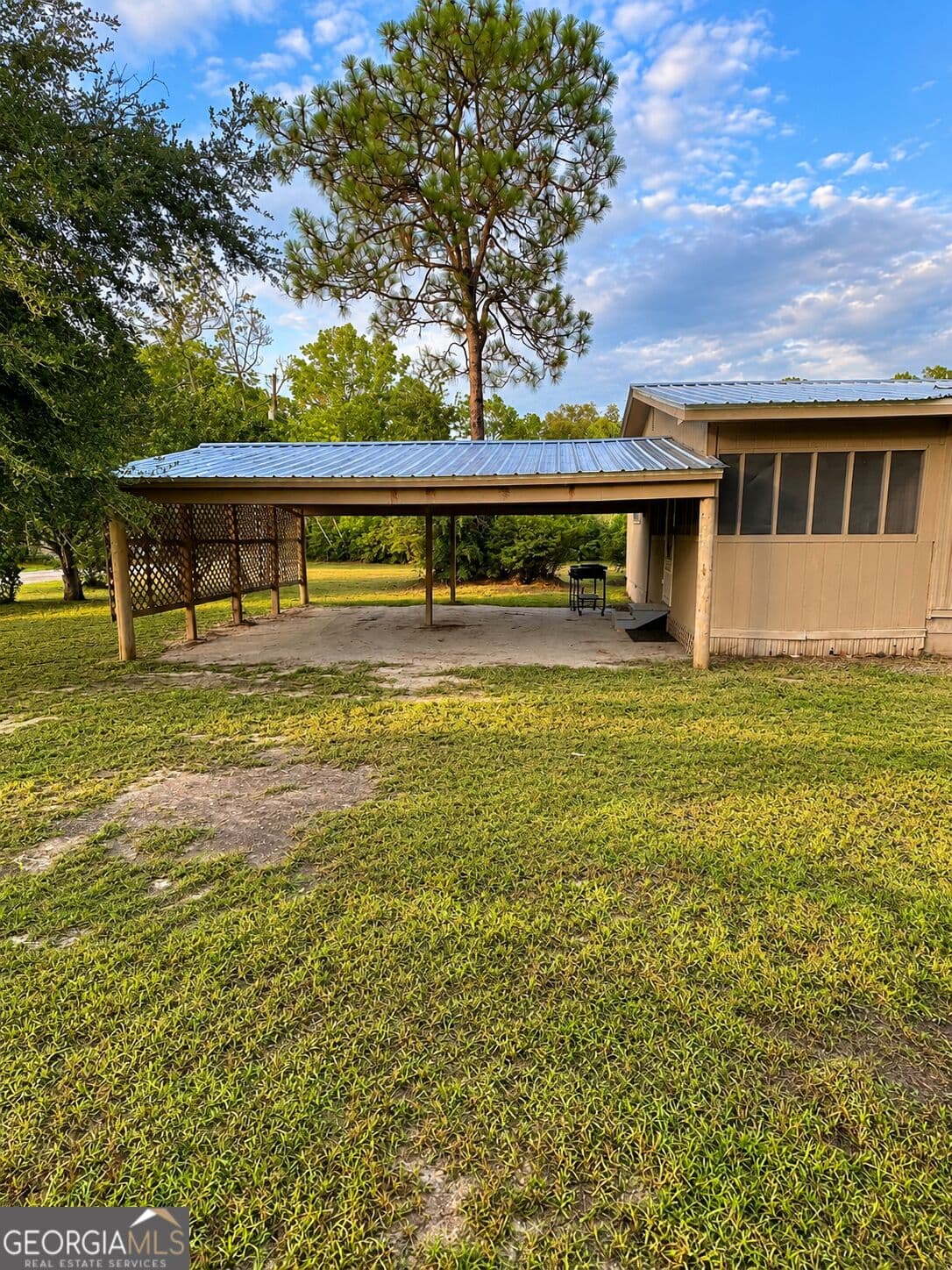 4 bedroom, 1.5 bathroom, 1,280 sq ft manufactured home,single family residence for sale at 118 Mosley Street, Reidsville, GA 30453 — photo 4