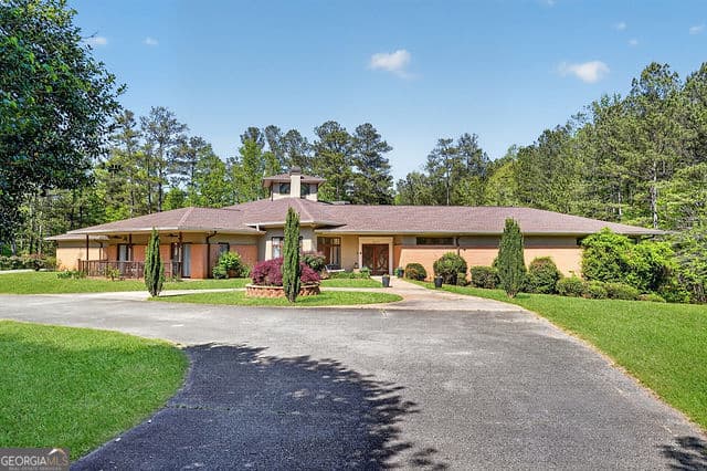 6 bedroom, 7 bathroom, 14,400 sq ft single family residence for sale at 3073 Demooney Road, South Fulton, GA 30349