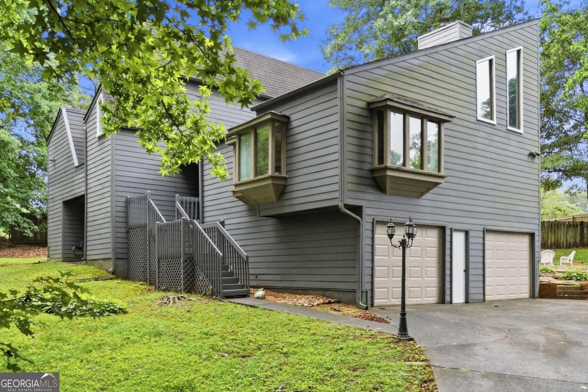 4 bedroom, 3 bathroom, 2,432 sq ft single family residence sold at 3219 Rangers Gate Drive, Marietta, GA 30062