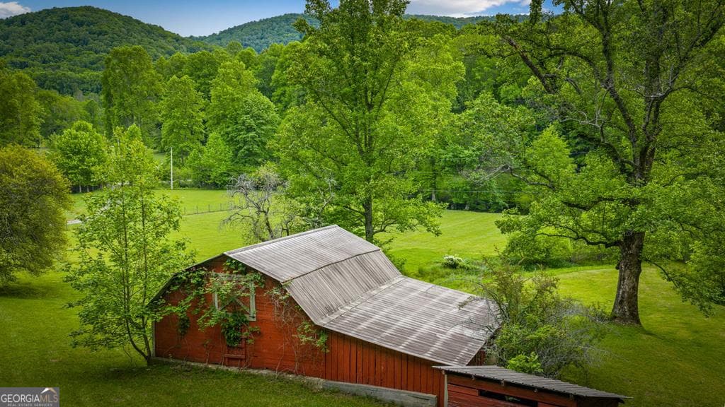 5 bedroom, 5 bathroom, 4,950 sq ft cabin,single family residence for sale at 2100 Big Creek Road, Cherry Log, GA 30522 — photo 4