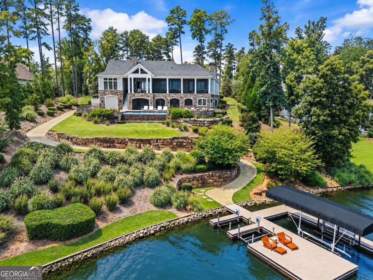 6 bedroom, 5 bathroom, 6,521 sq ft single family residence for sale at 1030 South Shoals Drive, Greensboro, GA 30642 — photo 2