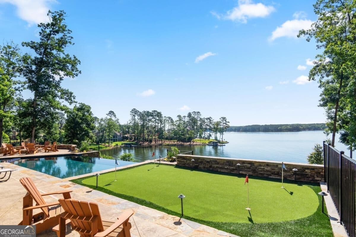 6 bedroom, 5 bathroom, 6,521 sq ft single family residence for sale at 1030 South Shoals Drive, Greensboro, GA 30642 — photo 6