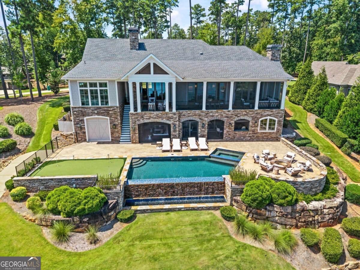 6 bedroom, 5 bathroom, 6,521 sq ft single family residence for sale at 1030 South Shoals Drive, Greensboro, GA 30642 — photo 3