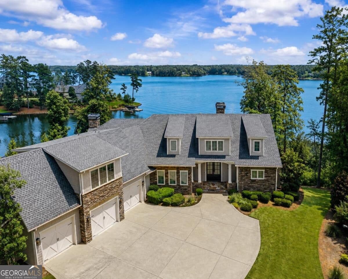 6 bedroom, 5 bathroom, 6,521 sq ft single family residence for sale at 1030 South Shoals Drive, Greensboro, GA 30642