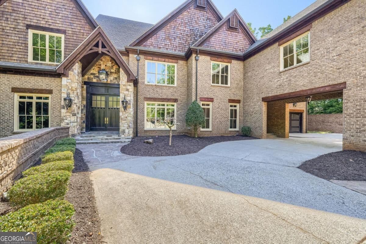 8 bedroom, 9.5 bathroom single family residence for sale at 7965 Robin Road, Cumming, GA 30041 — photo 6