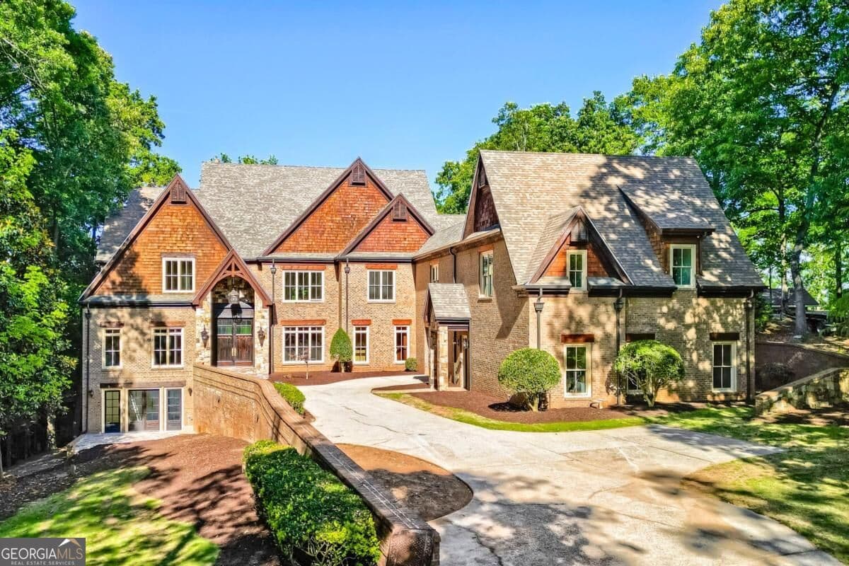 8 bedroom, 9.5 bathroom single family residence for sale at 7965 Robin Road, Cumming, GA 30041 — photo 1 of 64