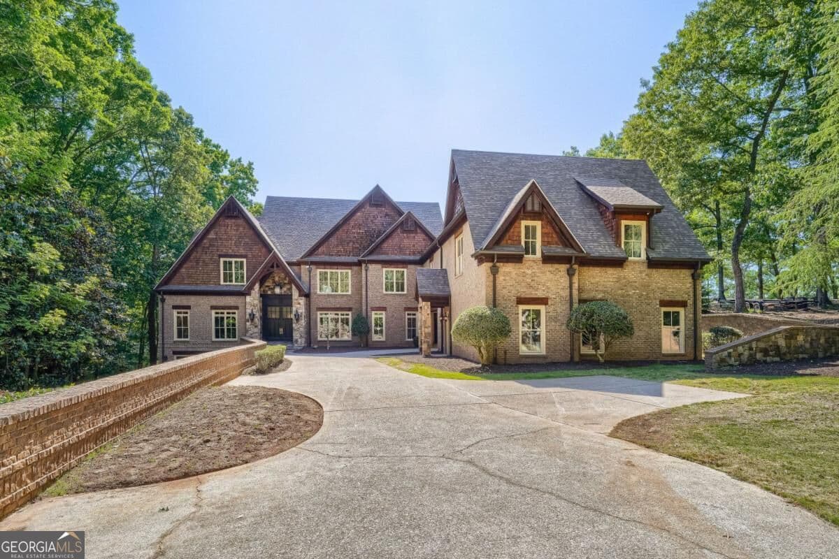 8 bedroom, 9.5 bathroom single family residence for sale at 7965 Robin Road, Cumming, GA 30041 — photo 4