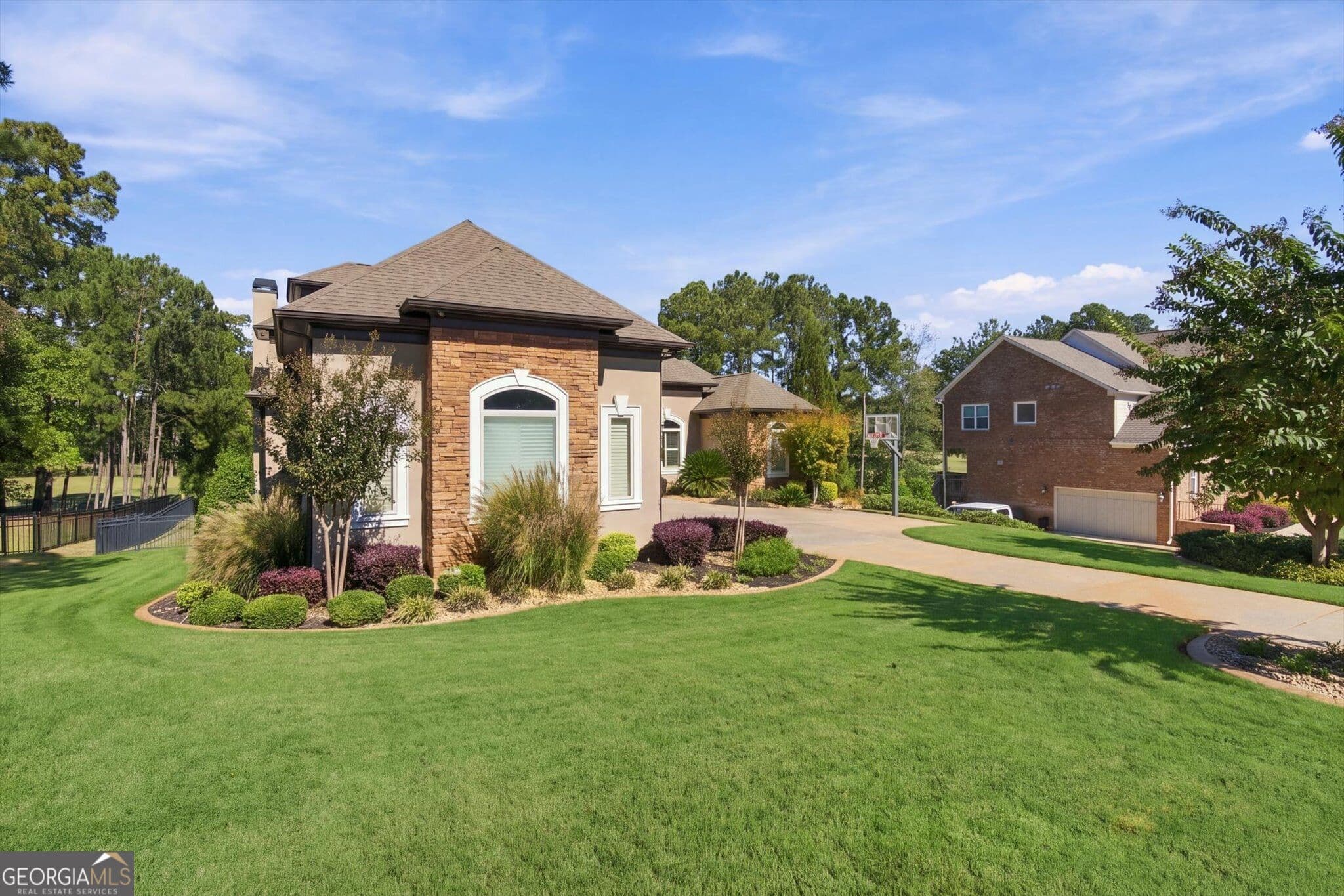 5 bedroom, 6 bathroom, 7,944 sq ft single family residence for sale at 1509 Windward Drive, Locust Grove, GA 30248 — photo 3