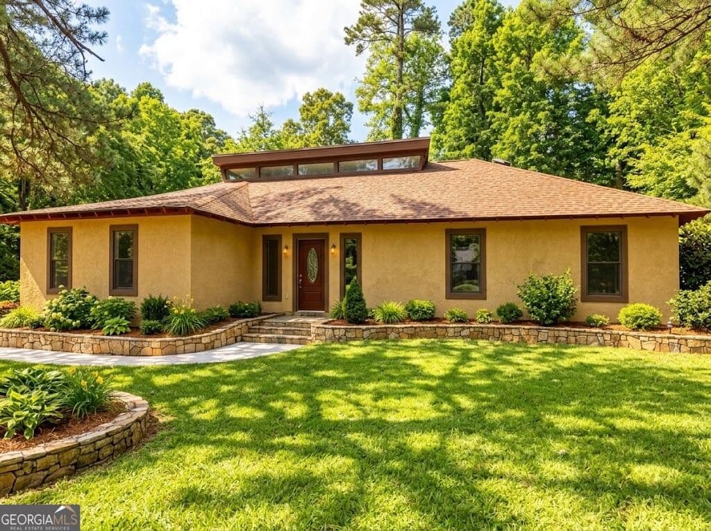 4 bedroom, 2 bathroom, 1,952 sq ft single family residence for sale at 1288 Lakewood Drive, Conyers, GA 30013 — photo 1 of 43