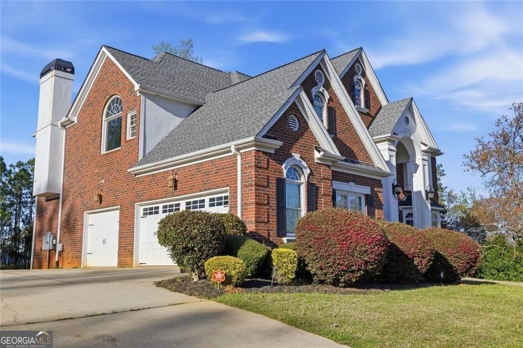 7 bedroom, 5.5 bathroom, 5,969 sq ft single family residence for sale at 5662 Tuxedo Drive, Douglasville, GA 30135 — photo 2