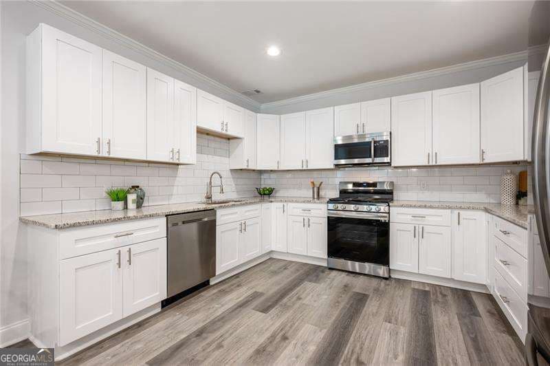 3 bedroom, 2 bathroom, 1,400 sq ft single family residence for sale at 872 Beryl Street, Atlanta, GA 30310 — photo 5