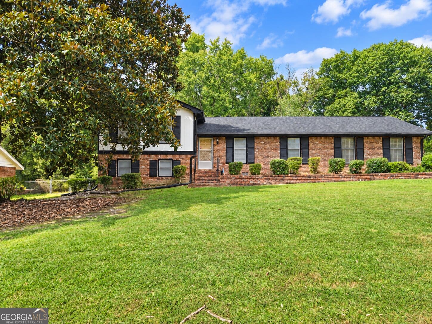 4 bedroom, 2 bathroom, 1,864 sq ft single family residence for sale at 6547 Annette Court, Riverdale, GA 30296 — photo 2