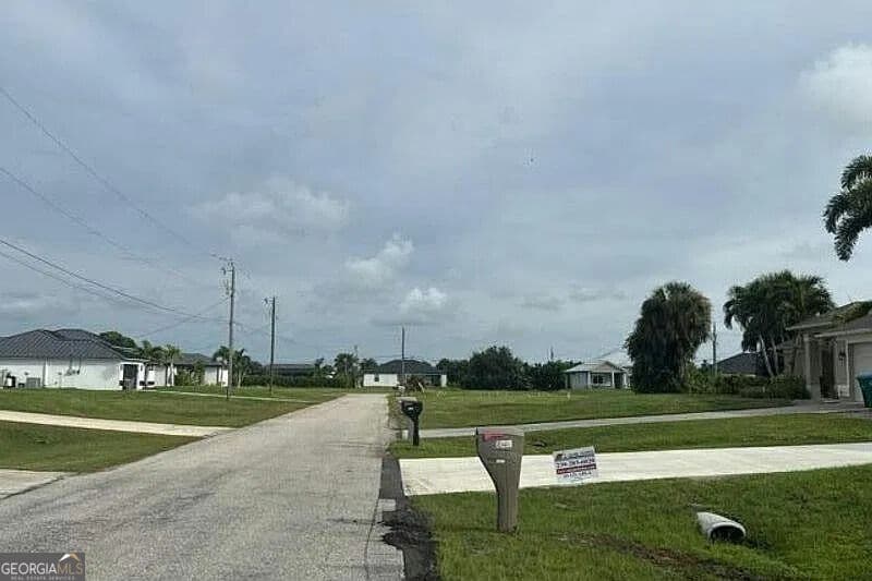 3 bedroom, 2 bathroom, 2,035 sq ft single family residence for sale at 235 NW 25th Place, Cape Coral, FL 33993 — photo 5