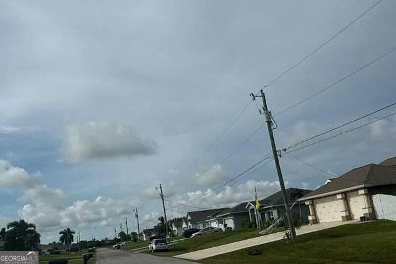 3 bedroom, 2 bathroom, 2,035 sq ft single family residence for sale at 235 NW 25th Place, Cape Coral, FL 33993 — photo 4