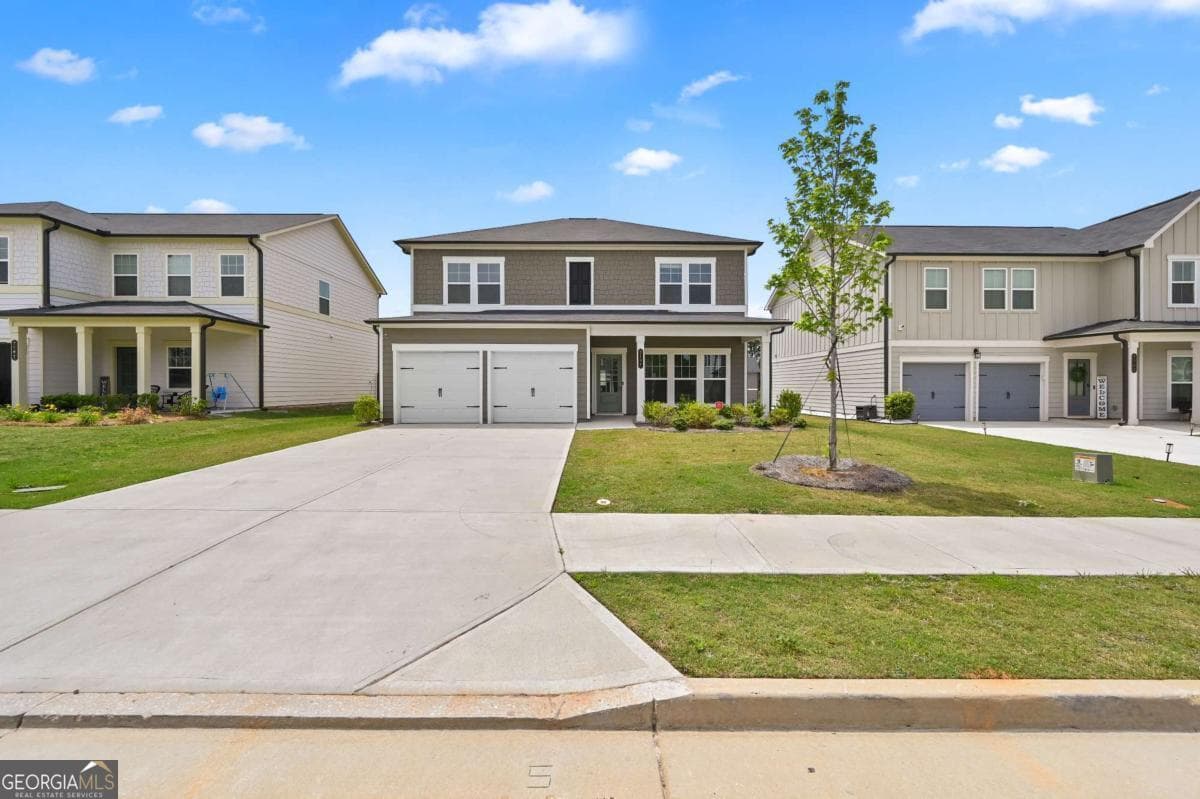 4 bedroom, 2.5 bathroom, 2,192 sq ft single family residence for sale at 2197 Boxwood Circle, Conyers, GA 30094 — photo 1 of 42
