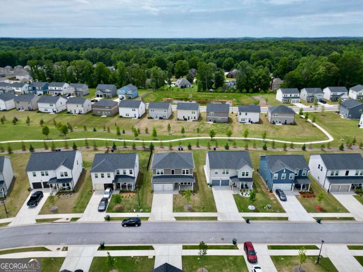 4 bedroom, 2.5 bathroom, 2,192 sq ft single family residence for sale at 2197 Boxwood Circle, Conyers, GA 30094 — photo 5