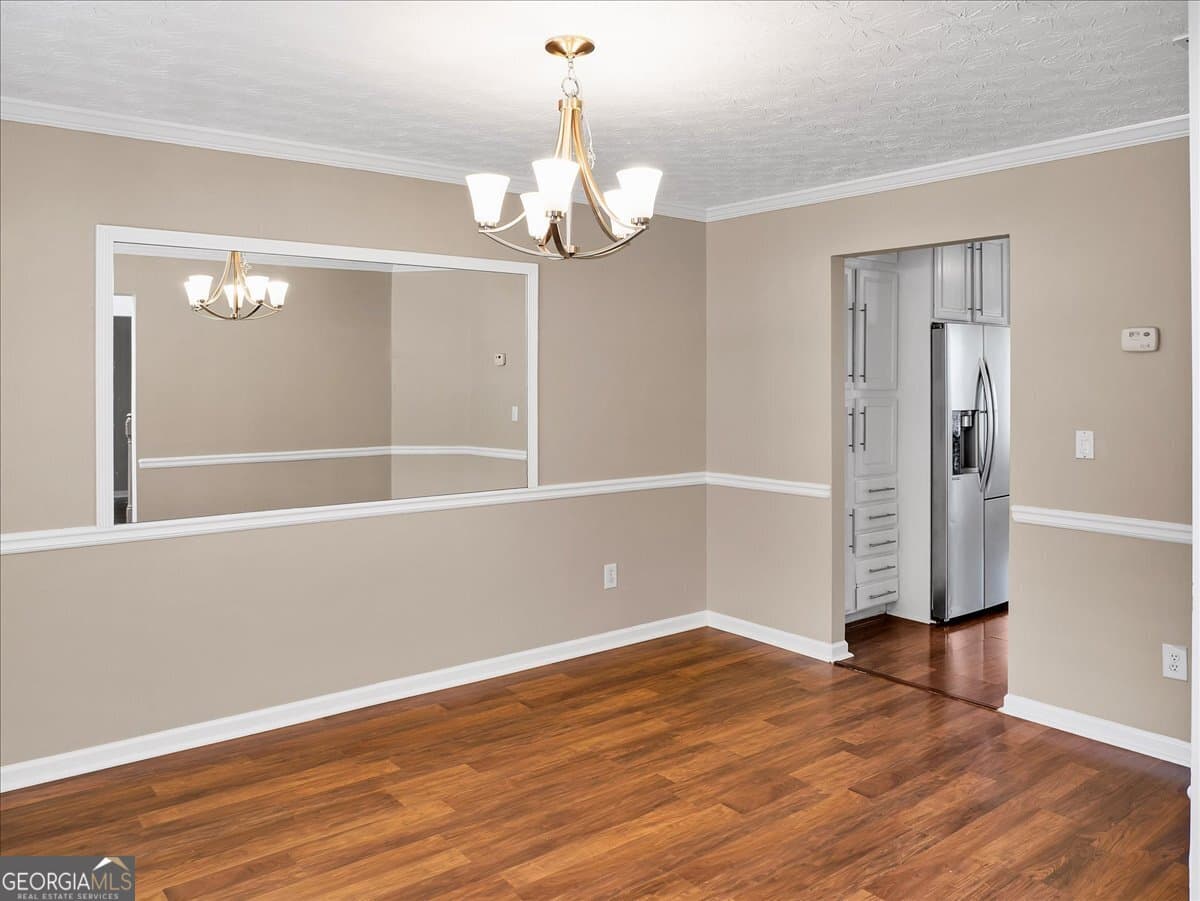 4 bedroom, 2.5 bathroom, 2,807 sq ft single family residence for sale at 3725 Crescent Walk Lane, Suwanee, GA 30024 — photo 4