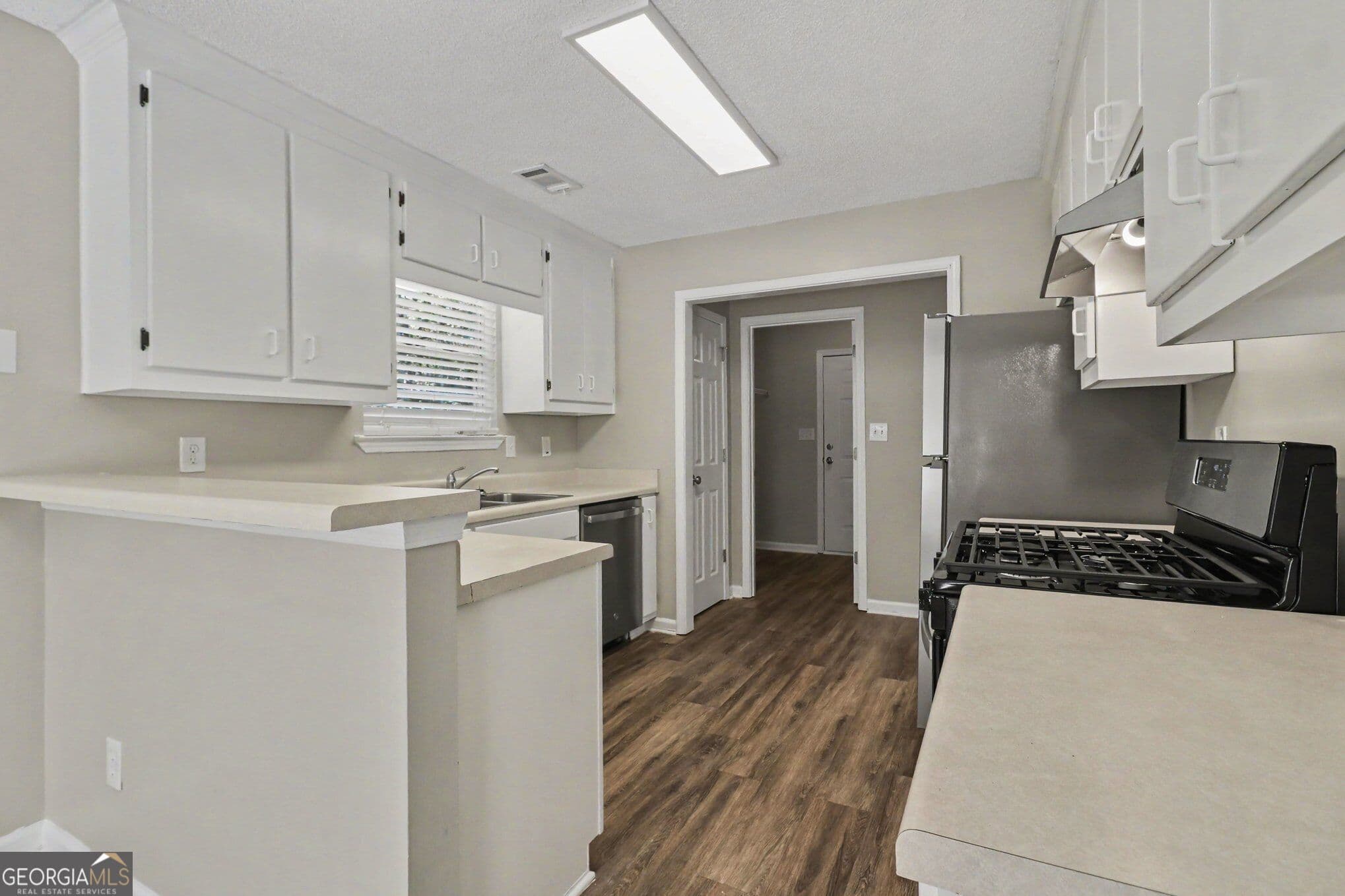 3 bedroom, 2 bathroom, 1,558 sq ft single family residence for sale at 140 Cannon Drive, Fayetteville, GA 30214 — photo 10