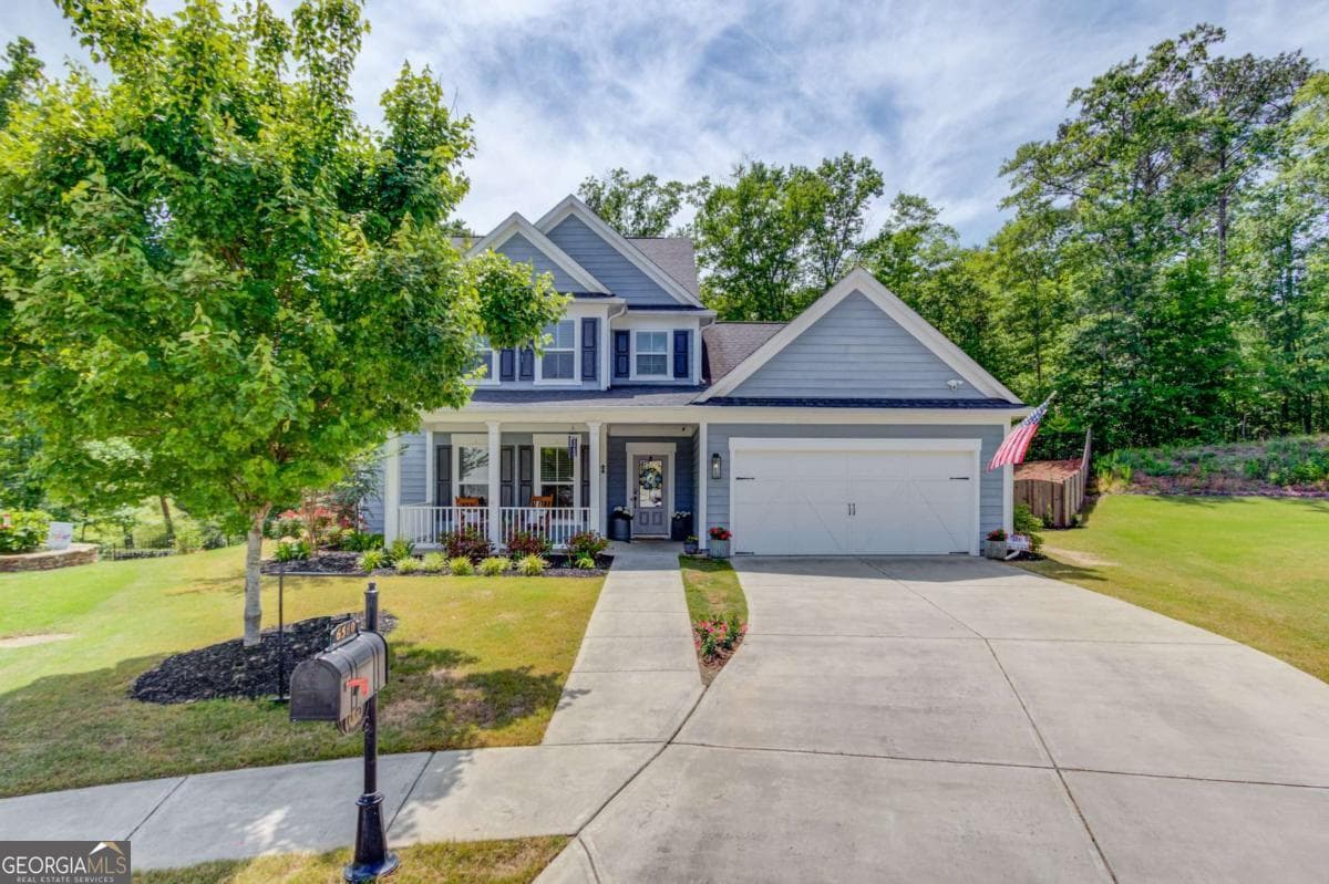 4 bedroom, 3.5 bathroom, 3,028 sq ft single family residence sold at 6580 Red Hawk Way, Hoschton, GA 30548