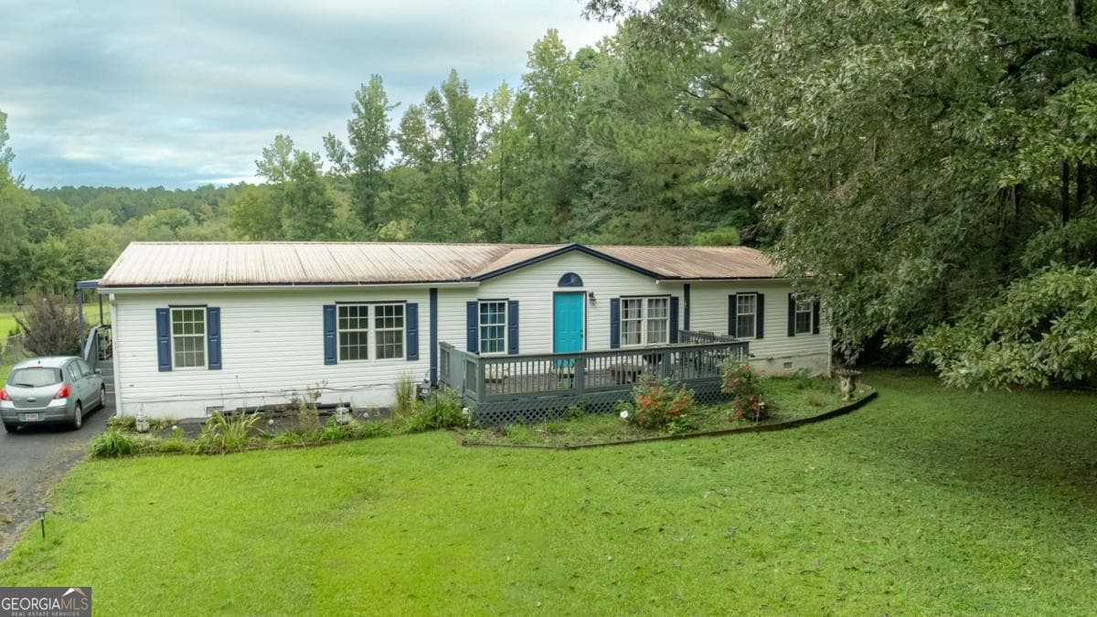 4 bedroom, 2 bathroom, 2,176 sq ft manufactured home,single family residence for sale at 1170 River Woods Drive, Madison, GA 30650