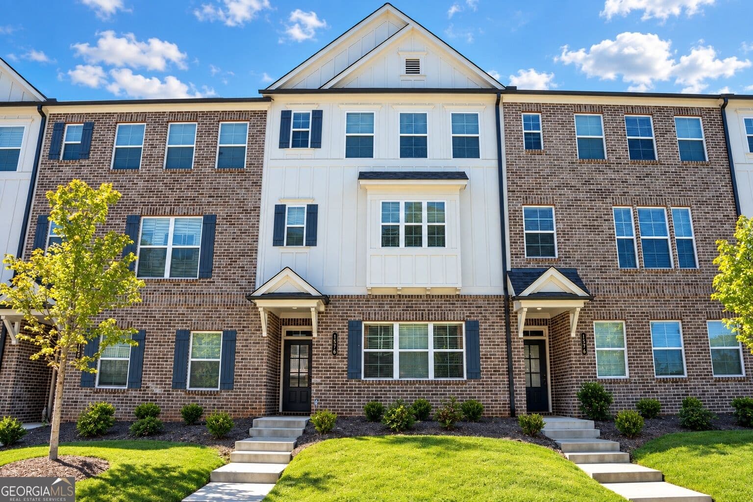 4 bedroom, 3.5 bathroom, 2,271 sq ft townhouse for sale at 1576 Gin Blossom Circle, Lawrenceville, GA 30045 — photo 1 of 22