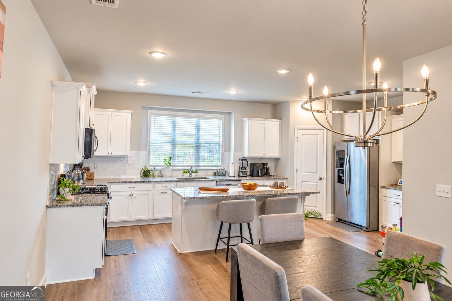 4 bedroom, 3.5 bathroom, 2,271 sq ft townhouse for sale at 1576 Gin Blossom Circle, Lawrenceville, GA 30045 — photo 4