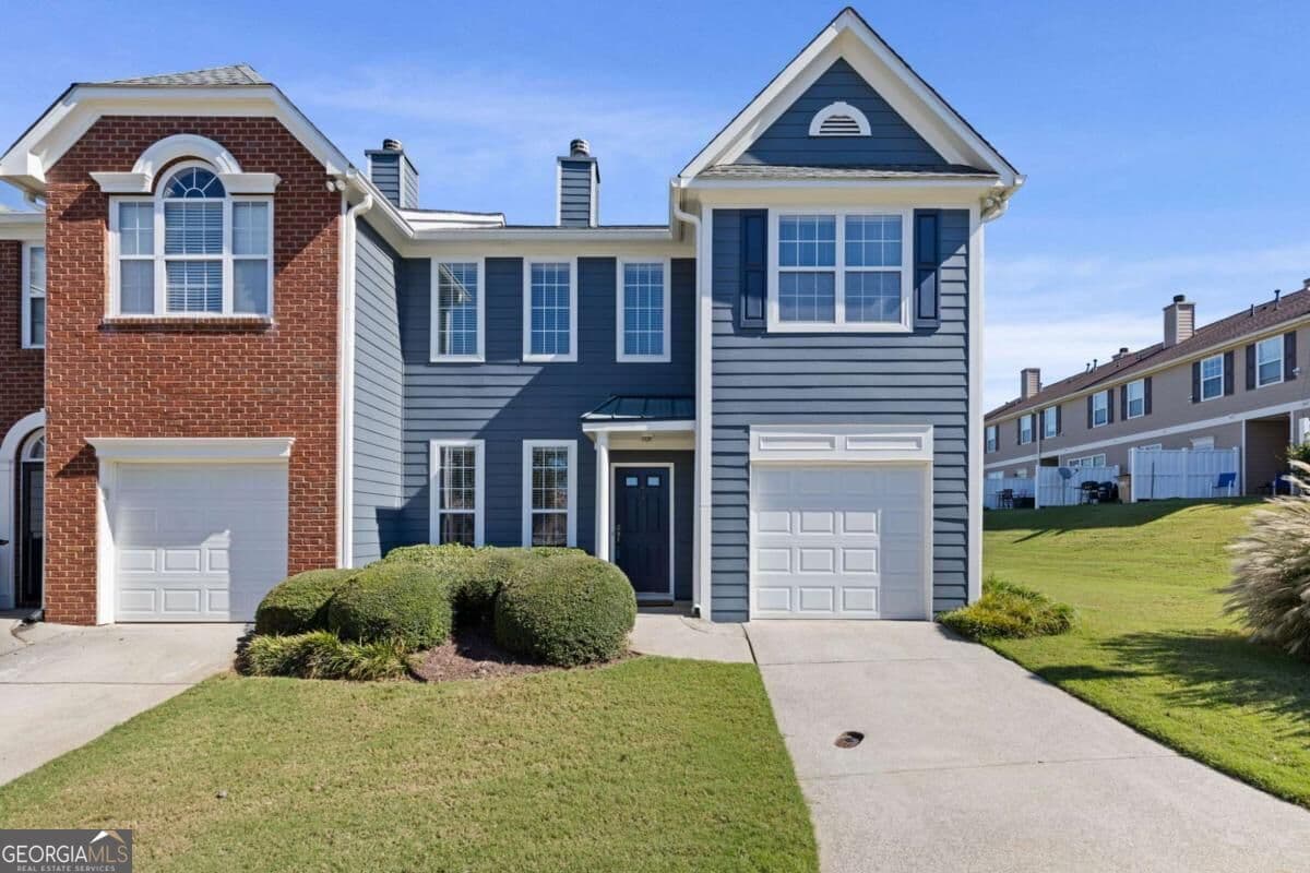 3 bedroom, 2.5 bathroom, 2,008 sq ft townhouse for sale at 6472 Portside Way, Flowery Branch, GA 30542 — photo 1 of 50