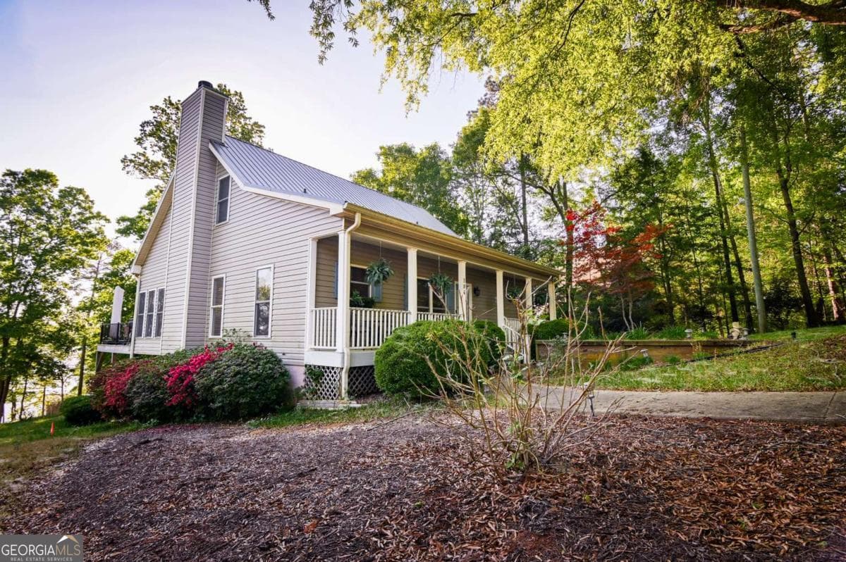 4 bedroom, 3.5 bathroom, 2,516 sq ft cabin,single family residence for sale at 194 Sugar Cane Drive, Hartwell, GA 30643 — photo 5