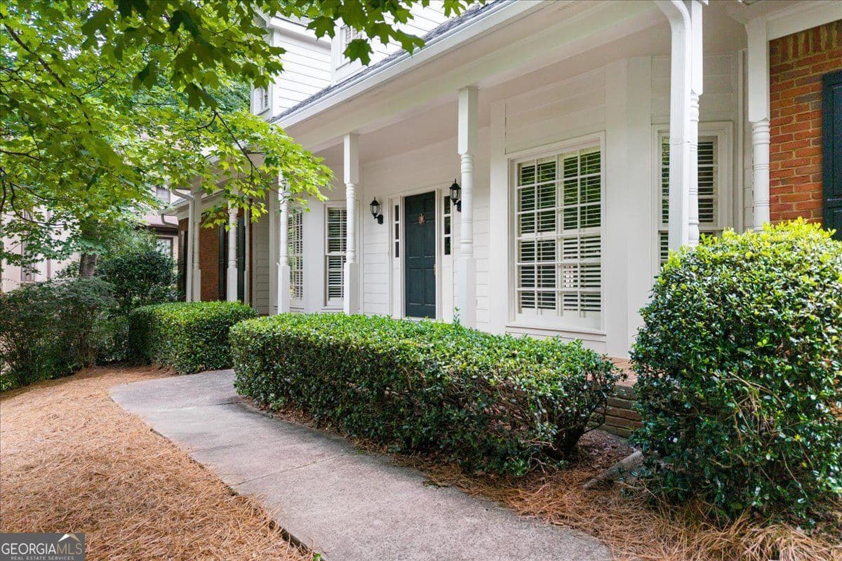 4 bedroom, 4.5 bathroom, 3,997 sq ft single family residence for sale at 8855 Glen Ferry Drive, Johns Creek, GA 30022 — photo 1 of 54