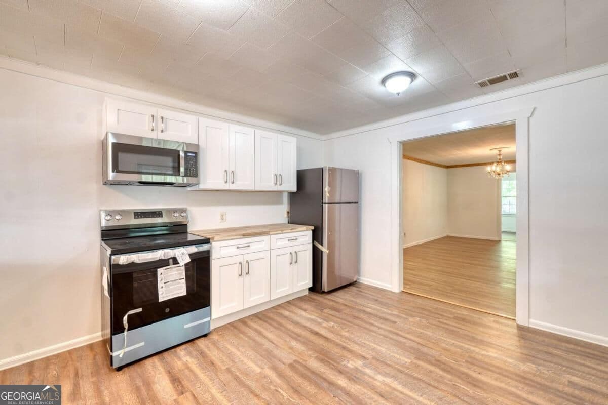 3 bedroom, 1 bathroom, 1,300 sq ft single family residence for sale at 6 U G A Drive, Blairsville, GA 30512 — photo 9