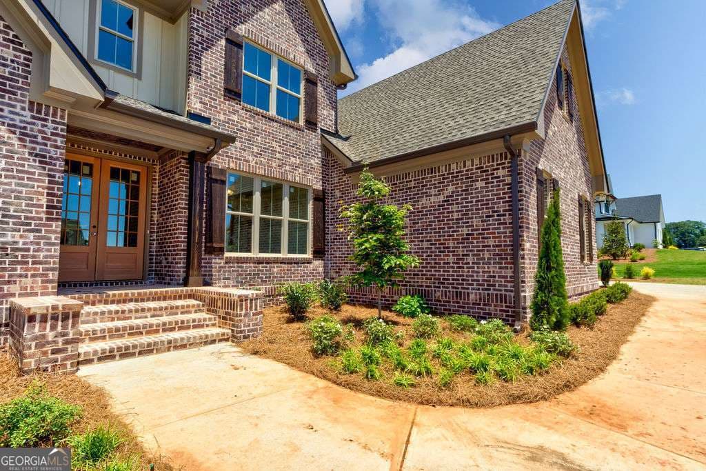 4 bedroom, 4.5 bathroom, 3,471 sq ft single family residence for sale at 2262 Malcom Estates Drive, Bogart, GA 30622 — photo 2