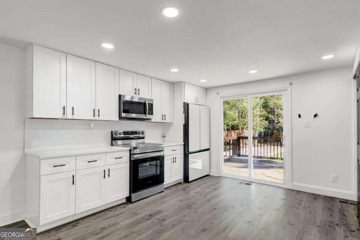 4 bedroom, 3 bathroom, 1,464 sq ft single family residence for sale at 3286 Sunderland Drive, Snellville, GA 30039 — photo 6