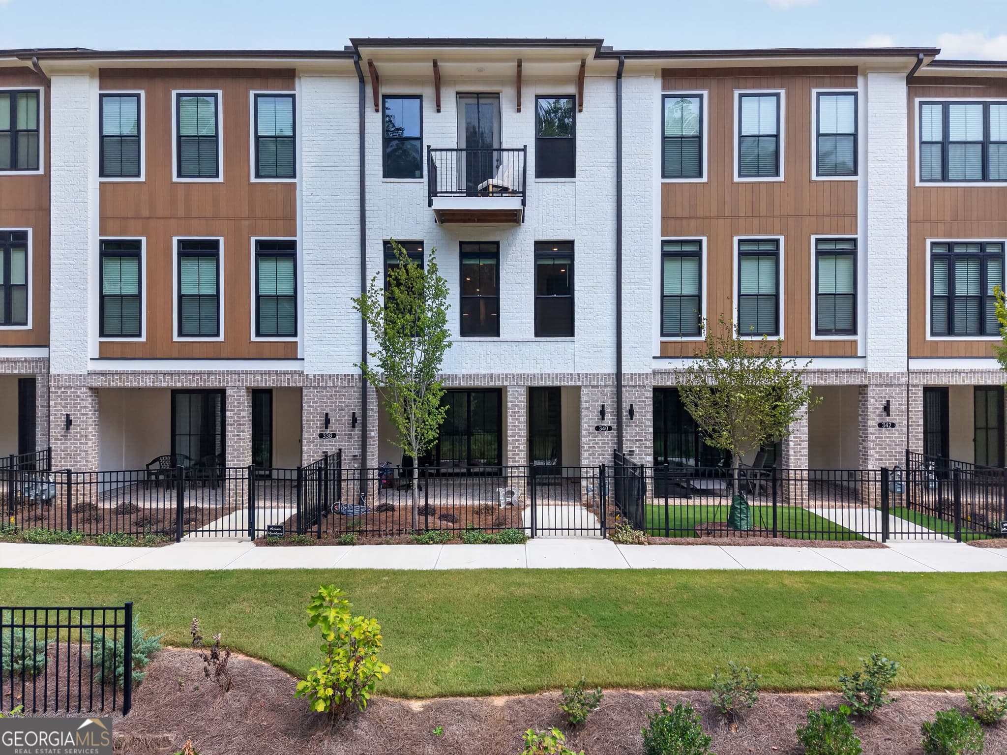 3 bedroom, 2.5 bathroom, 2,145 sq ft townhouse for sale at 340 Olmstead Way, Alpharetta, GA 30022