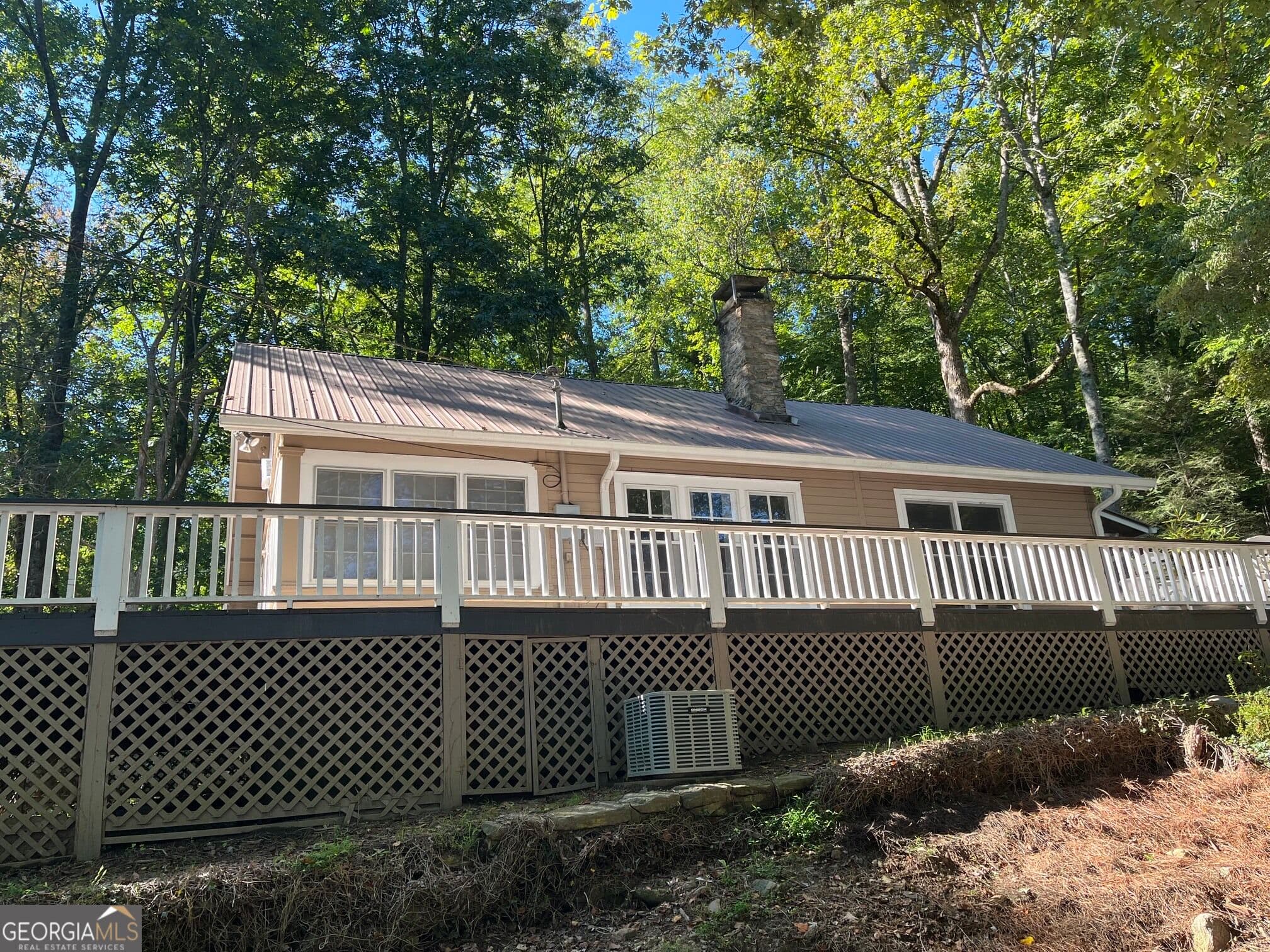 3 bedroom, 1.5 bathroom, 1,925 sq ft single family residence for rent at 3835 Highway 441, Rabun Gap, GA 30568 for $1,900 a month — photo 2