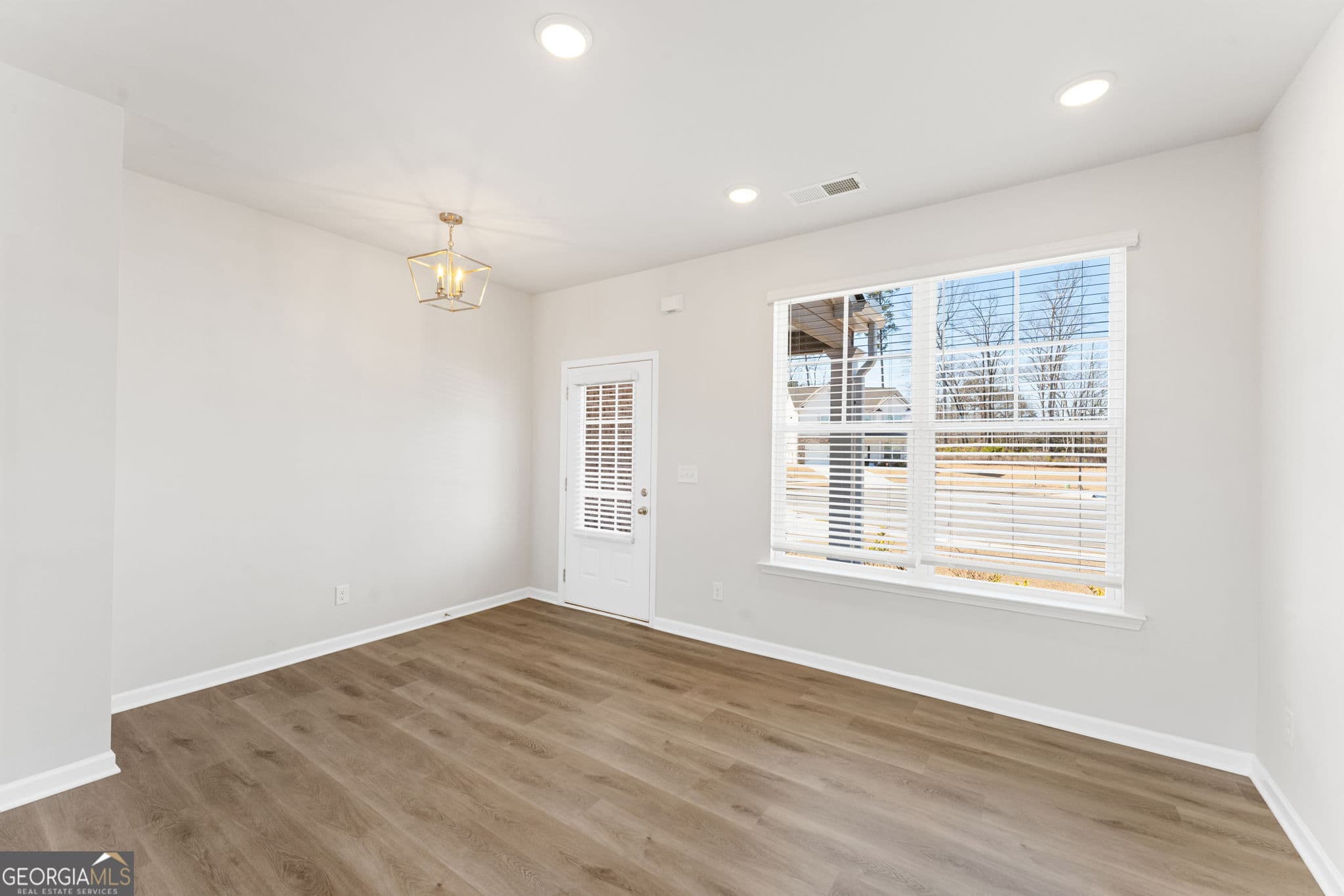 4 bedroom, 2.5 bathroom, 2,148 sq ft single family residence for sale at 5975 Spring Way, Stonecrest, GA 30038 — photo 4