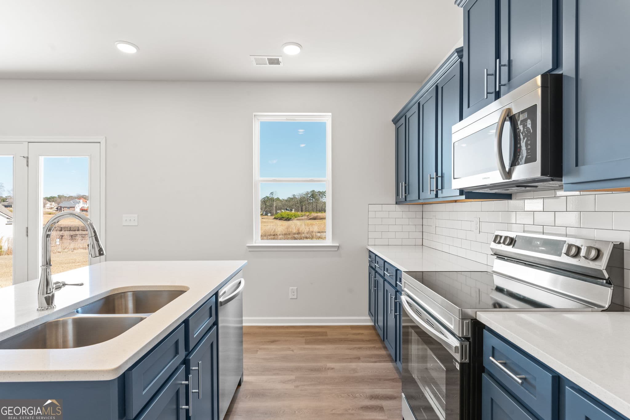 4 bedroom, 2.5 bathroom, 2,148 sq ft single family residence for sale at 5975 Spring Way, Stonecrest, GA 30038 — photo 8