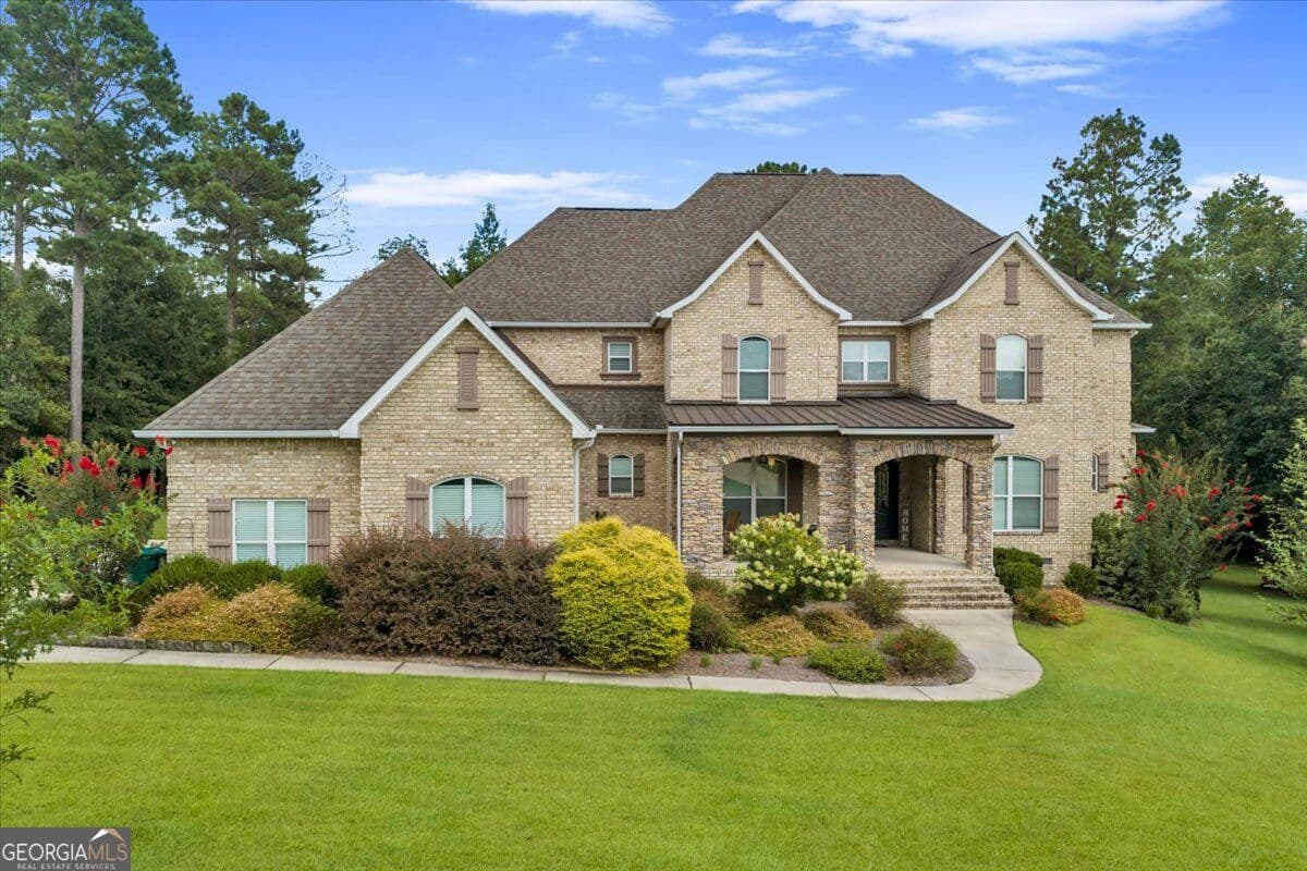 5 bedroom, 4.5 bathroom, 5,875 sq ft single family residence for sale at 223 Yale Circle, Bonaire, GA 31005 — photo 2